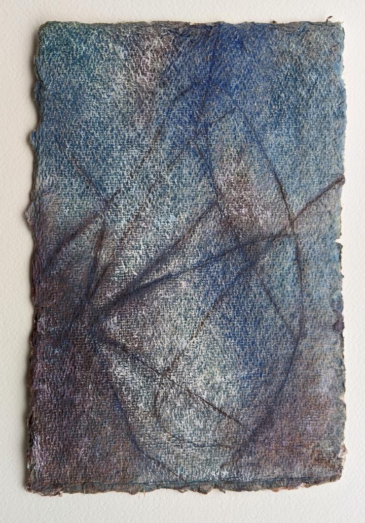 An abstract painting using line that's carved into the paper to resemble an egg shape, on a maroon and blue background