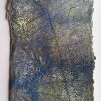 An abstract painting of a purple and yellow background with lines carved into the paper, taken from medieval graffiti found in a church in Kingston