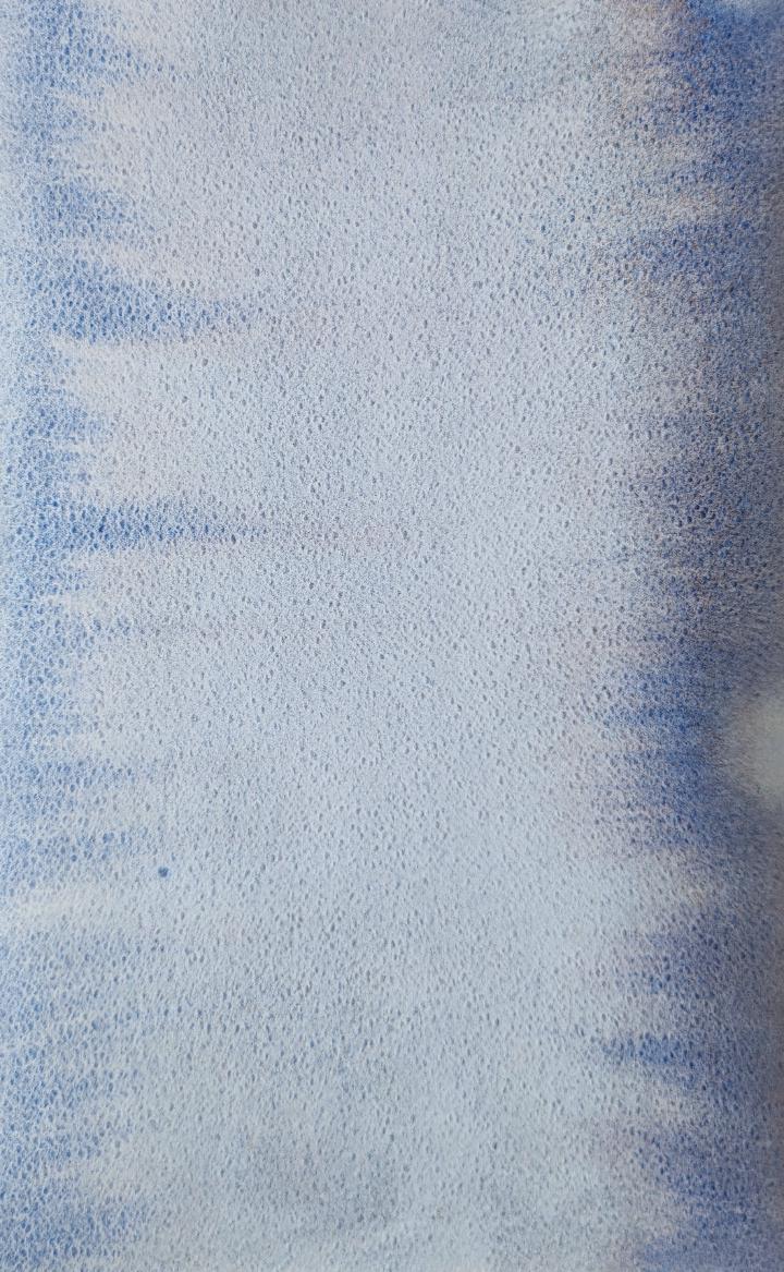 An abstract painting of blue and brown pigment running from the sides of the page towards the middle. A pale blue dot is on the left, and a glowing crescent is on the right.
