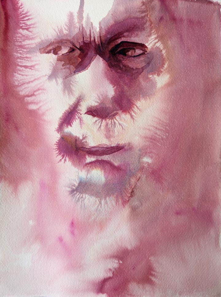 loose watercolour portrait in shades of red of a face with furrowed brow, very many watercolour bleeds define the form of the face and just touches of detail are added around the eyes and mouth