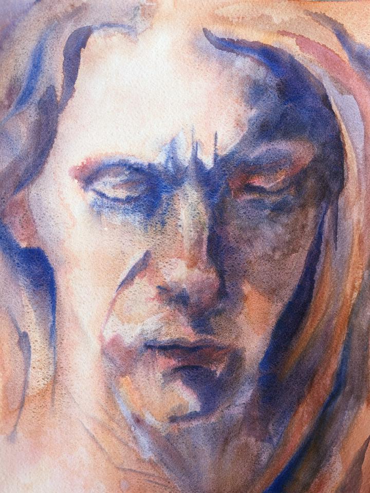 loose watercolour portrait in shades of orange and blue of a face looking down, with lighting coming from the left