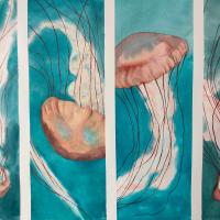 four panels of a jellyfish floating in a dark turquoise sea