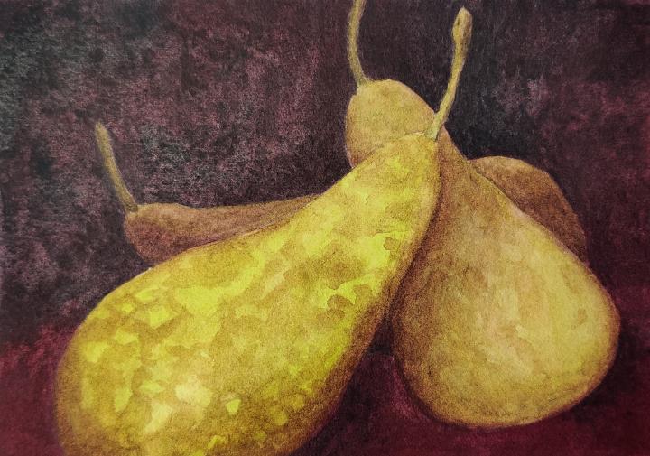 yellow-green pears on a dark background chiaroscuro